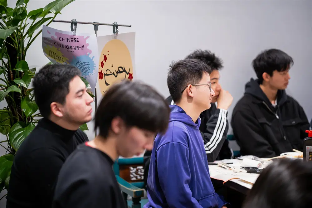 Calligraphy exchange at the founding evening, NYU Shanghai
